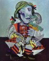 Hija de Maya Picasso con una muñeca 1938 Pablo Picasso